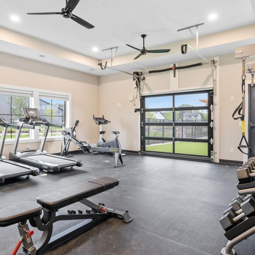 a room with treadmills and treadmills