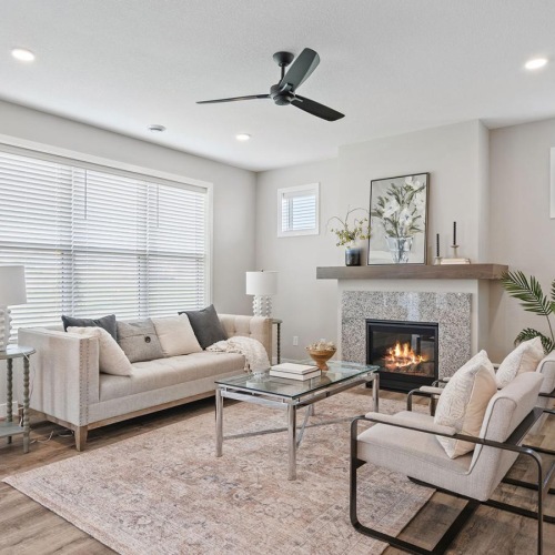 a living room with a fireplace