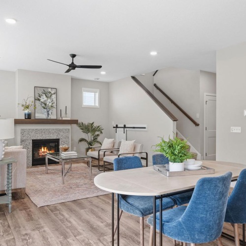 a large living room with a fireplace