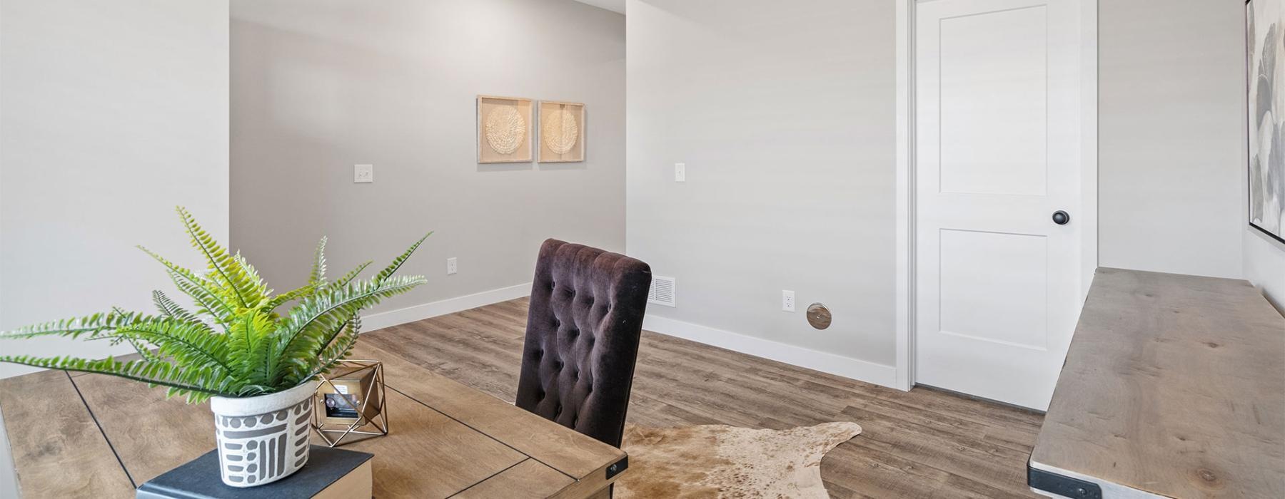 a room with a table and chairs